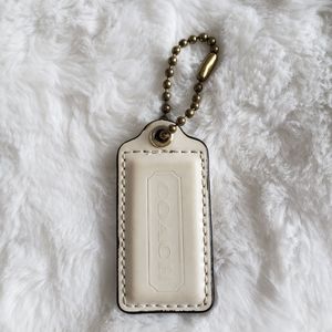 Coach 2.5" patent leather cream off white tag charm